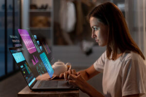 Woman using a laptop for a digital online assessment