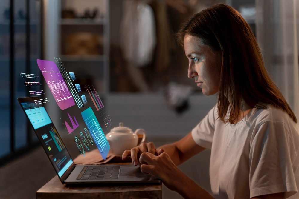Woman using a laptop for a digital online assessment